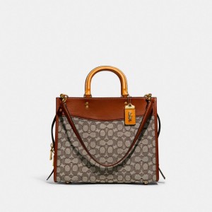 COACH® Rogue In Signature Textile Jacquard Håndtaske Dame Brune Grå | DKZUS236