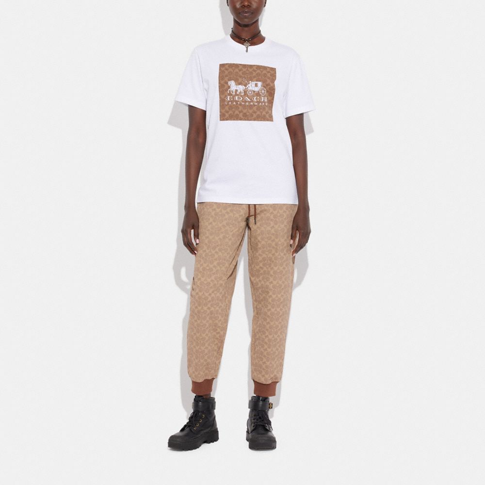 COACH® Signature Horse And Carriage In Organic Cotton T Shirts Dame Hvide Brune | DKYXN573